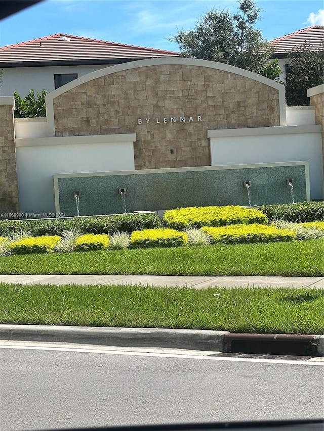 view of community sign