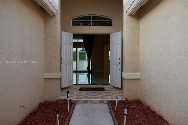 1380 Meadows Blvd, Weston, FL 33327 - doorway to property with stucco siding