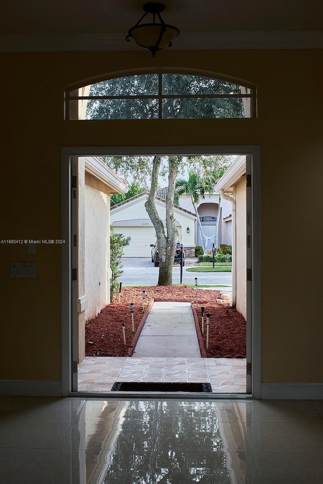 1380 Meadows Blvd, Weston, FL 33327 - doorway to outside with healthy amount of natural light
