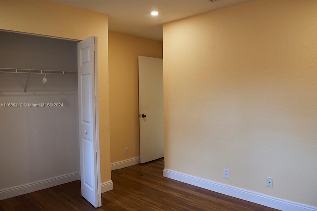 1380 Meadows Blvd, Weston, FL 33327 - unfurnished bedroom featuring dark wood finished floors, a closet, and recessed lighting