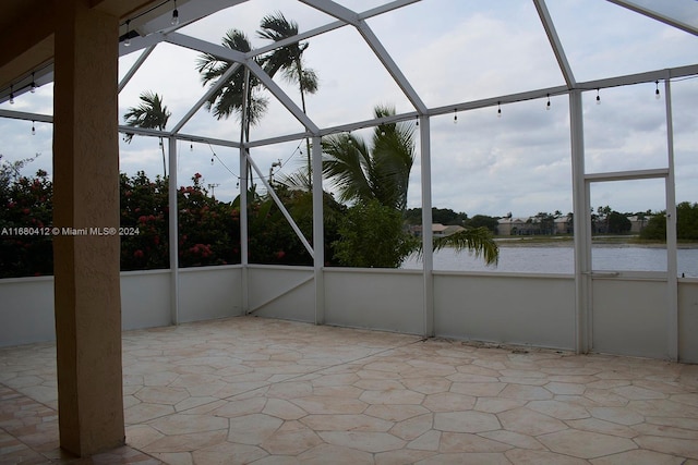 1380 Meadows Blvd, Weston, FL 33327 - unfurnished sunroom featuring a water view
