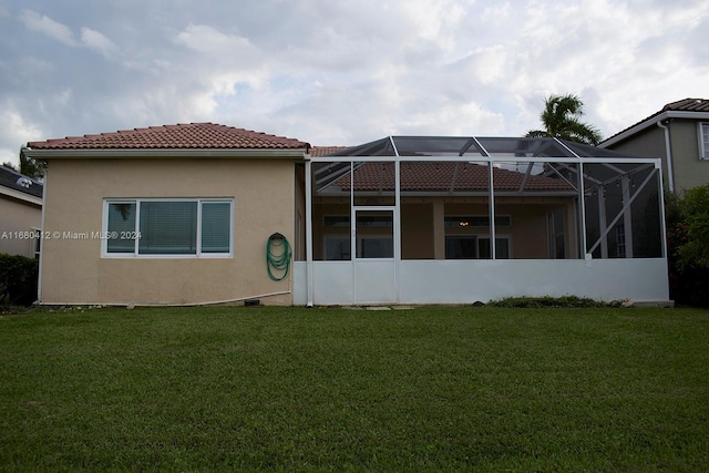 1380 Meadows Blvd, Weston, FL 33327 - back of property featuring a yard, a tile roof, stucco siding, and a lanai