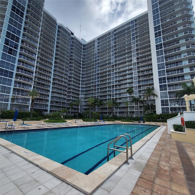 view of swimming pool featuring a patio