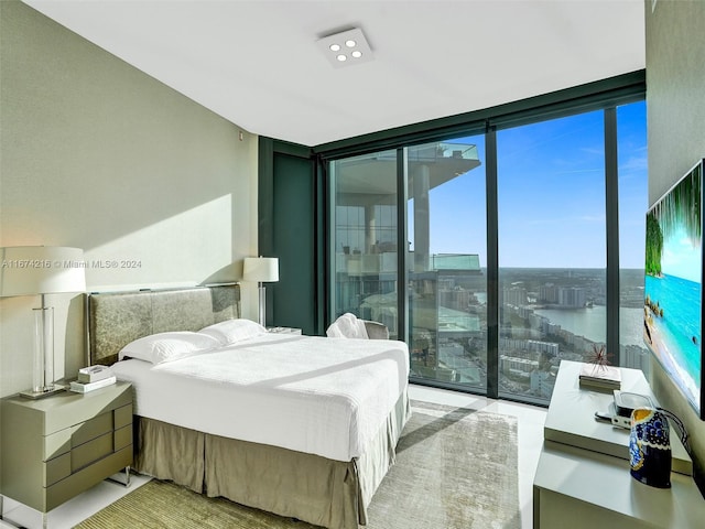 bedroom featuring expansive windows