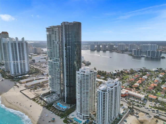 aerial view featuring a water view and a view of the beach