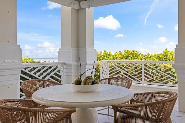 balcony featuring a water view