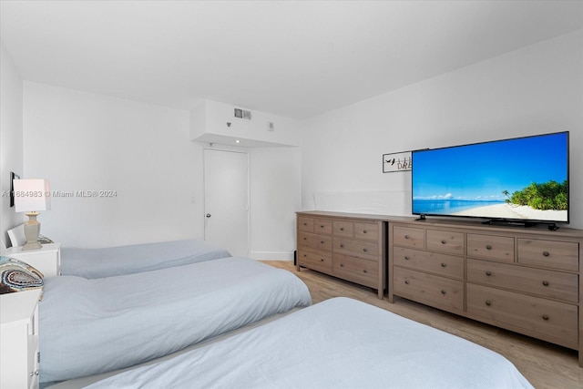 bedroom featuring light hardwood / wood-style floors