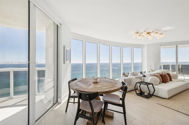 sunroom with a water view