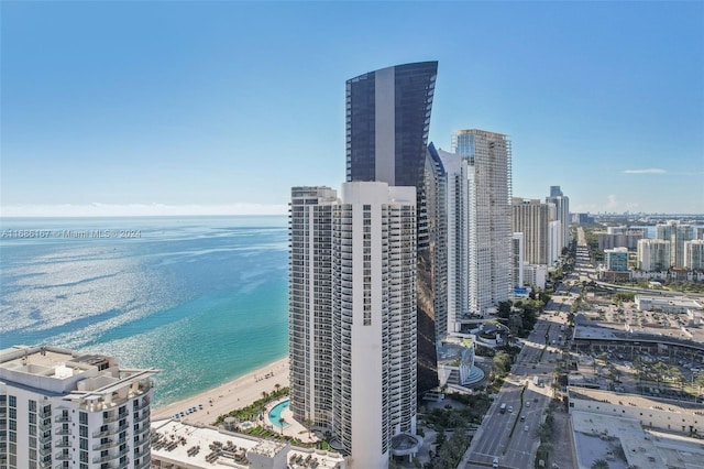 drone / aerial view with a view of the beach and a water view