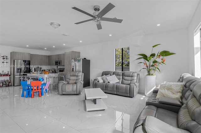 living room featuring ceiling fan