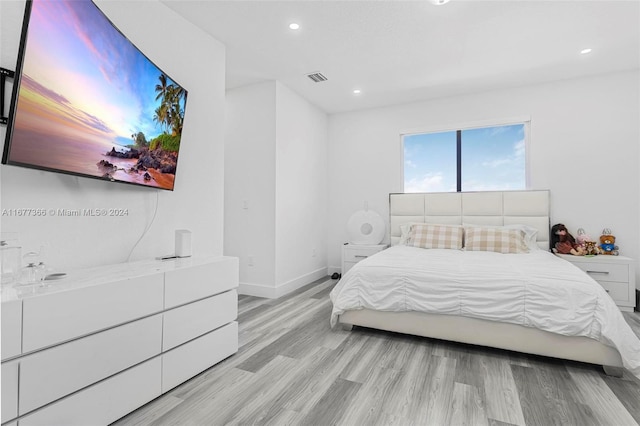 bedroom featuring light hardwood / wood-style flooring