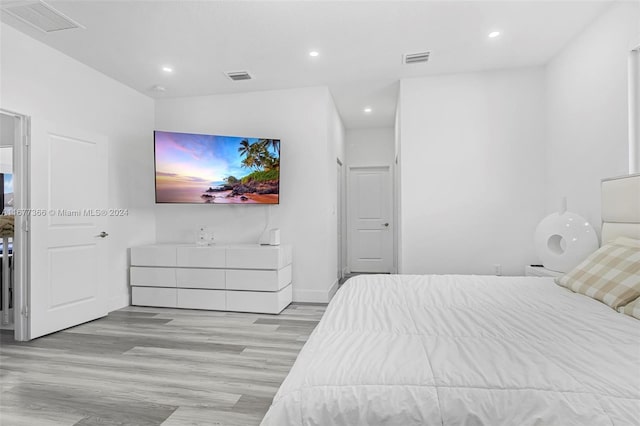 bedroom featuring light hardwood / wood-style floors