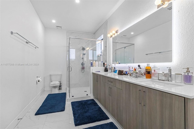 bathroom with toilet, an enclosed shower, and vanity