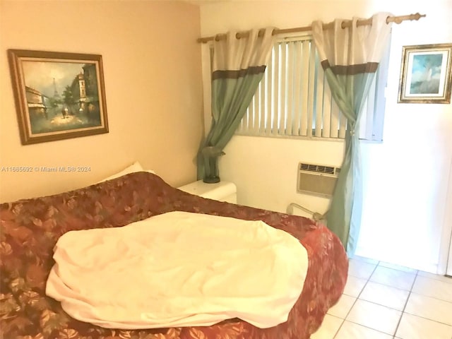 tiled bedroom featuring a wall mounted AC