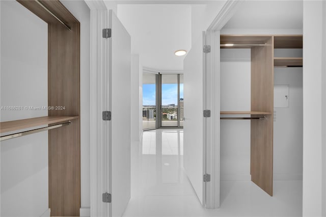 walk in closet featuring light tile patterned floors