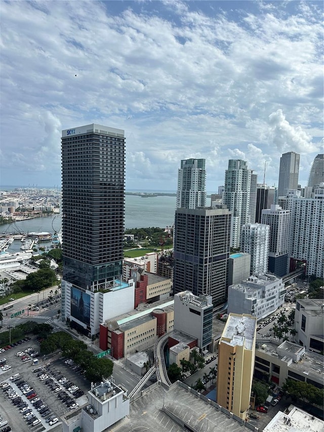 property's view of city featuring a water view