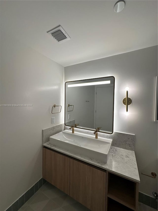 bathroom featuring vanity and tile patterned floors