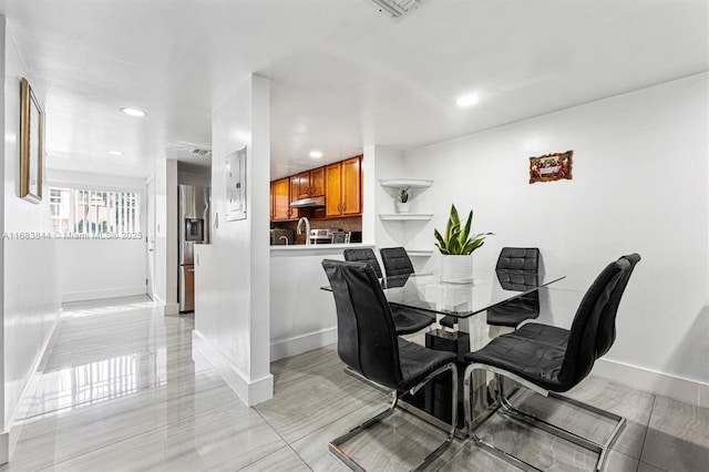 dining room with sink