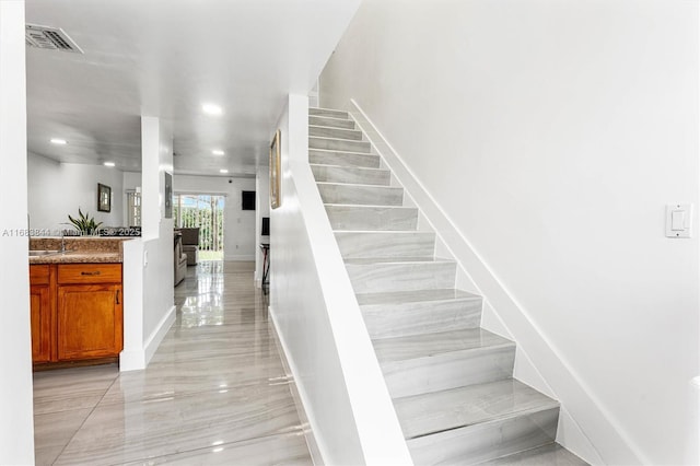 2650 NW 28th St Unit 908-9, Miami, FL 33142 - stairs with visible vents, recessed lighting, and baseboards