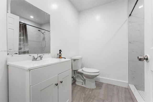 2650 NW 28th St Unit 908-9, Miami, FL 33142 - bathroom featuring toilet, a shower with curtain, vanity, and baseboards