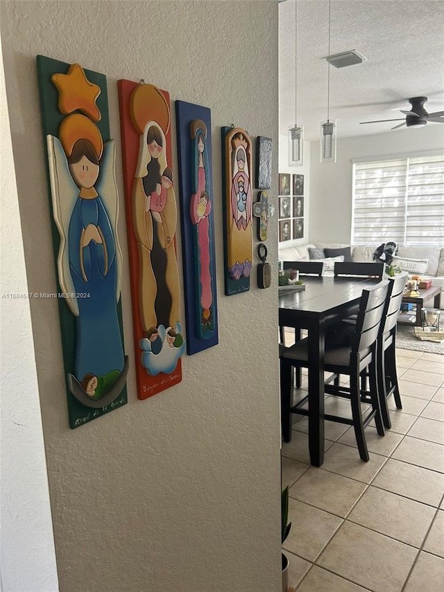 18730 SW 25th Ct Unit 18730, Miramar, FL 33029 - dining area with a textured wall, tile patterned flooring, ceiling fan, and a textured ceiling