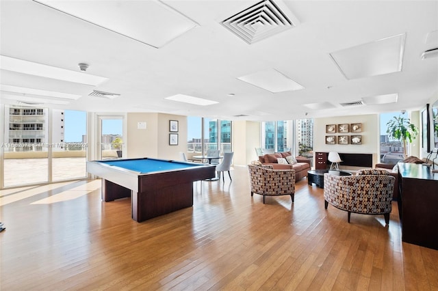 playroom with pool table and light wood-type flooring