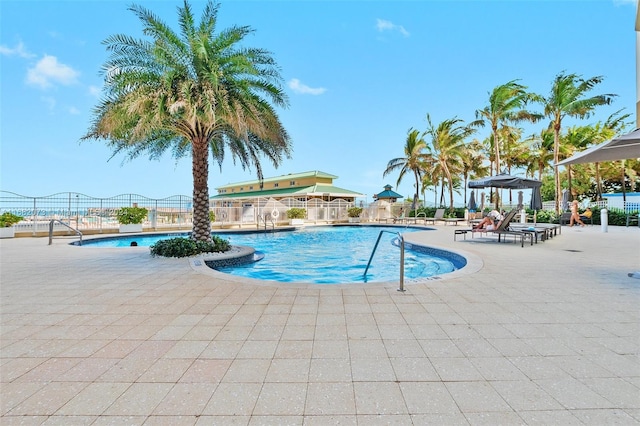 view of swimming pool featuring a patio