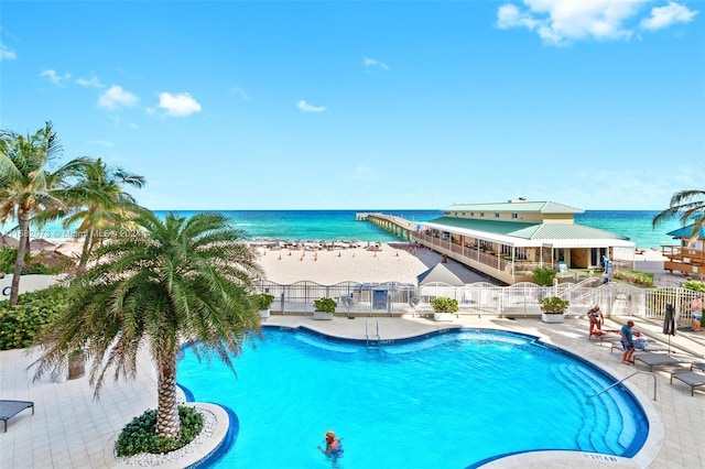 16699 Collins Ave Unit 2202, Sunny Isles Beach, FL 33160 - community pool featuring a water view and a patio area