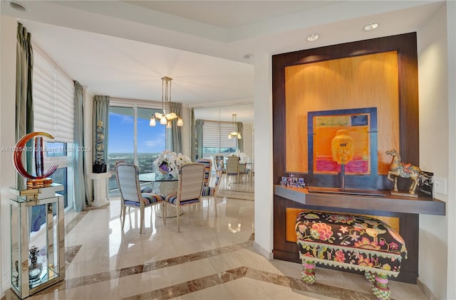 dining space with a notable chandelier