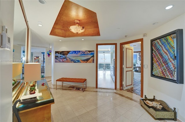 interior space featuring a tray ceiling