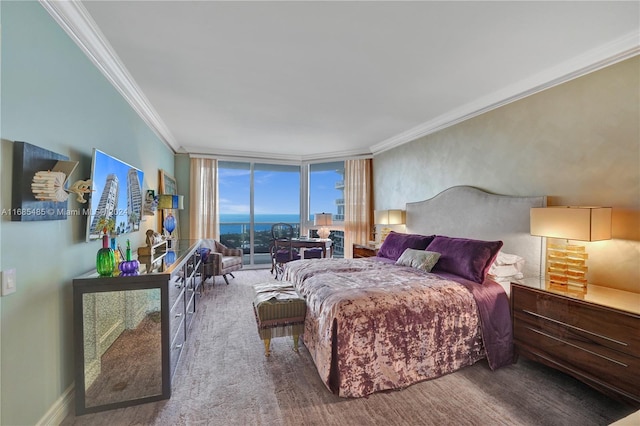 bedroom with ornamental molding, floor to ceiling windows, and carpet floors