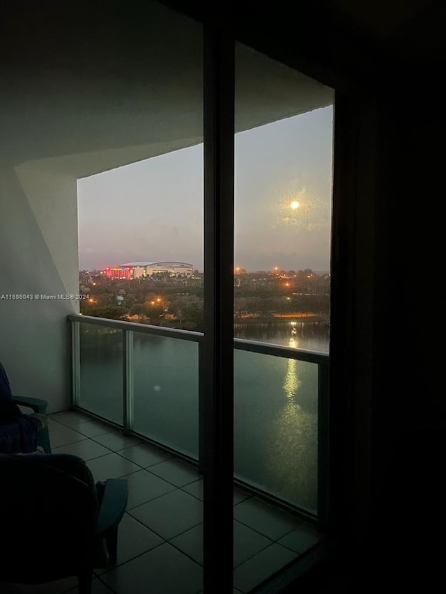 balcony at dusk with a water view