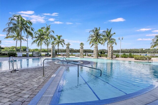 view of pool featuring a community hot tub