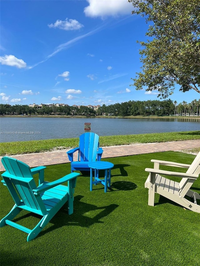 2641 N Flamingo Rd Unit 802N, Sunrise, FL 33323 - view of home's community with a lawn and a water view