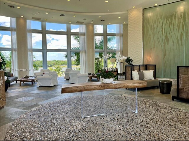 2641 N Flamingo Rd Unit 802N, Sunrise, FL 33323 - lobby with a towering ceiling, recessed lighting, and expansive windows