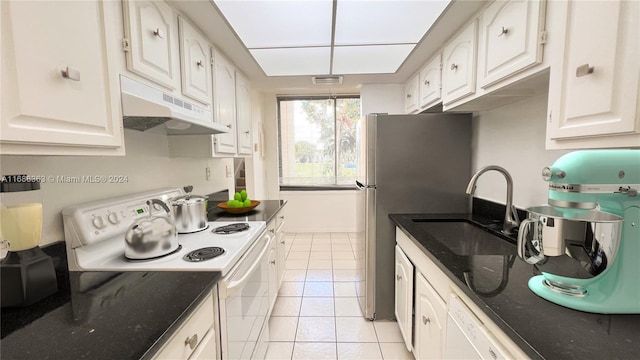 kitchen featuring exhaust hood, light tile patterned floors, white cabinetry, sink, and white appliances