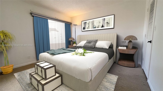 carpeted bedroom with a textured ceiling