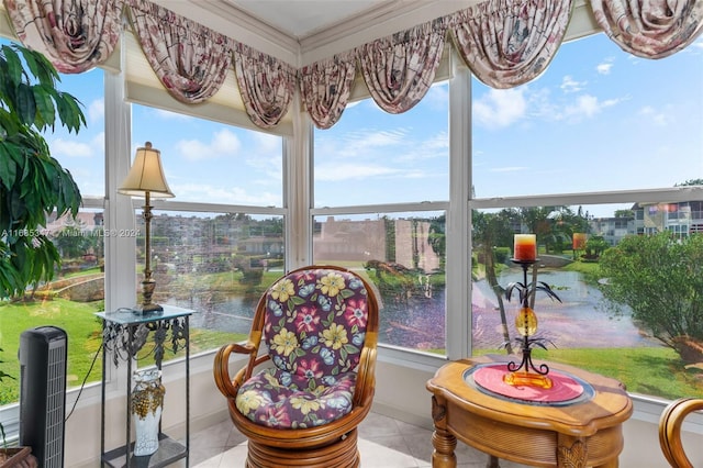 interior space with a wealth of natural light and a water view