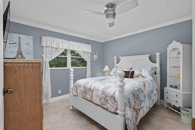 tiled bedroom featuring ornamental molding, a textured ceiling, and ceiling fan