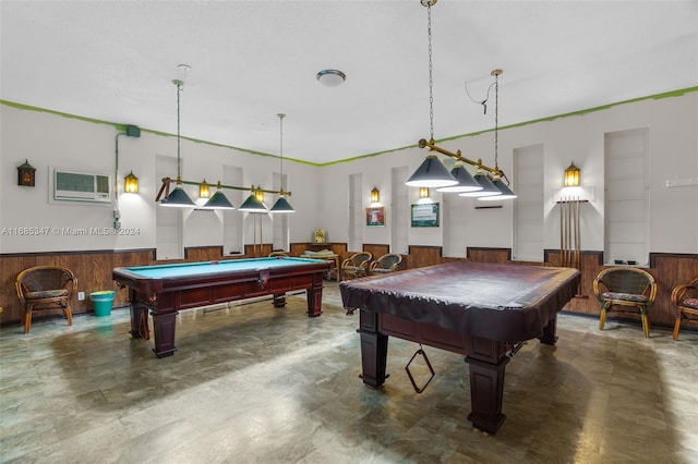 recreation room featuring a wall unit AC, pool table, and wood walls