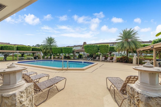 view of pool featuring a patio area