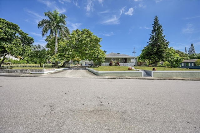 830 S Ridge St, Lake Worth, FL 33460 - view of property hidden behind natural elements with a front lawn