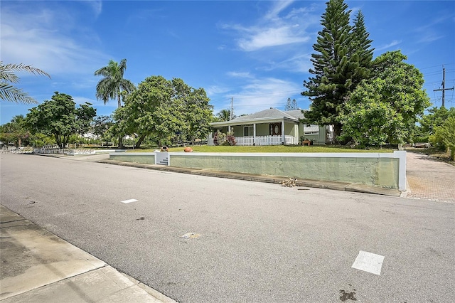 830 S Ridge St, Lake Worth, FL 33460 - view of front of house featuring covered porch