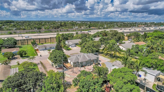 830 S Ridge St, Lake Worth, FL 33460 - aerial perspective of suburban area featuring a tree filled landscape