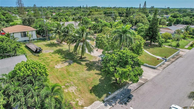 830 S Ridge St, Lake Worth, FL 33460 - aerial view of property and surrounding area featuring a tree filled landscape