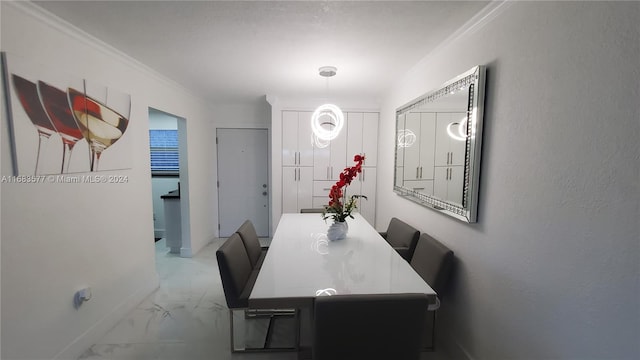 dining area featuring ornamental molding