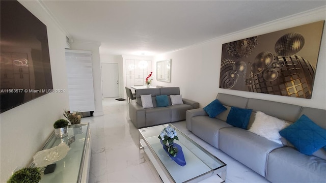 living room with ornamental molding