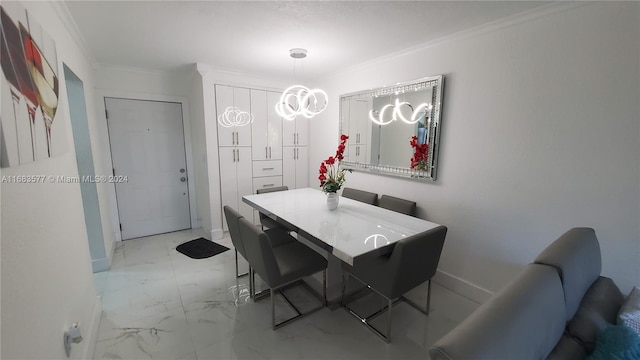 dining area featuring crown molding