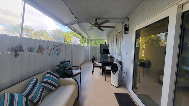 view of patio featuring an outdoor hangout area and ceiling fan