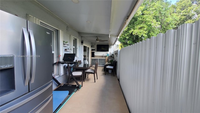 view of patio / terrace with ceiling fan